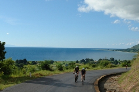 riders cycling away from Lake Malawi, 2005