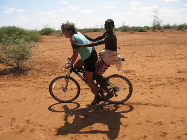 two people on a bicycle